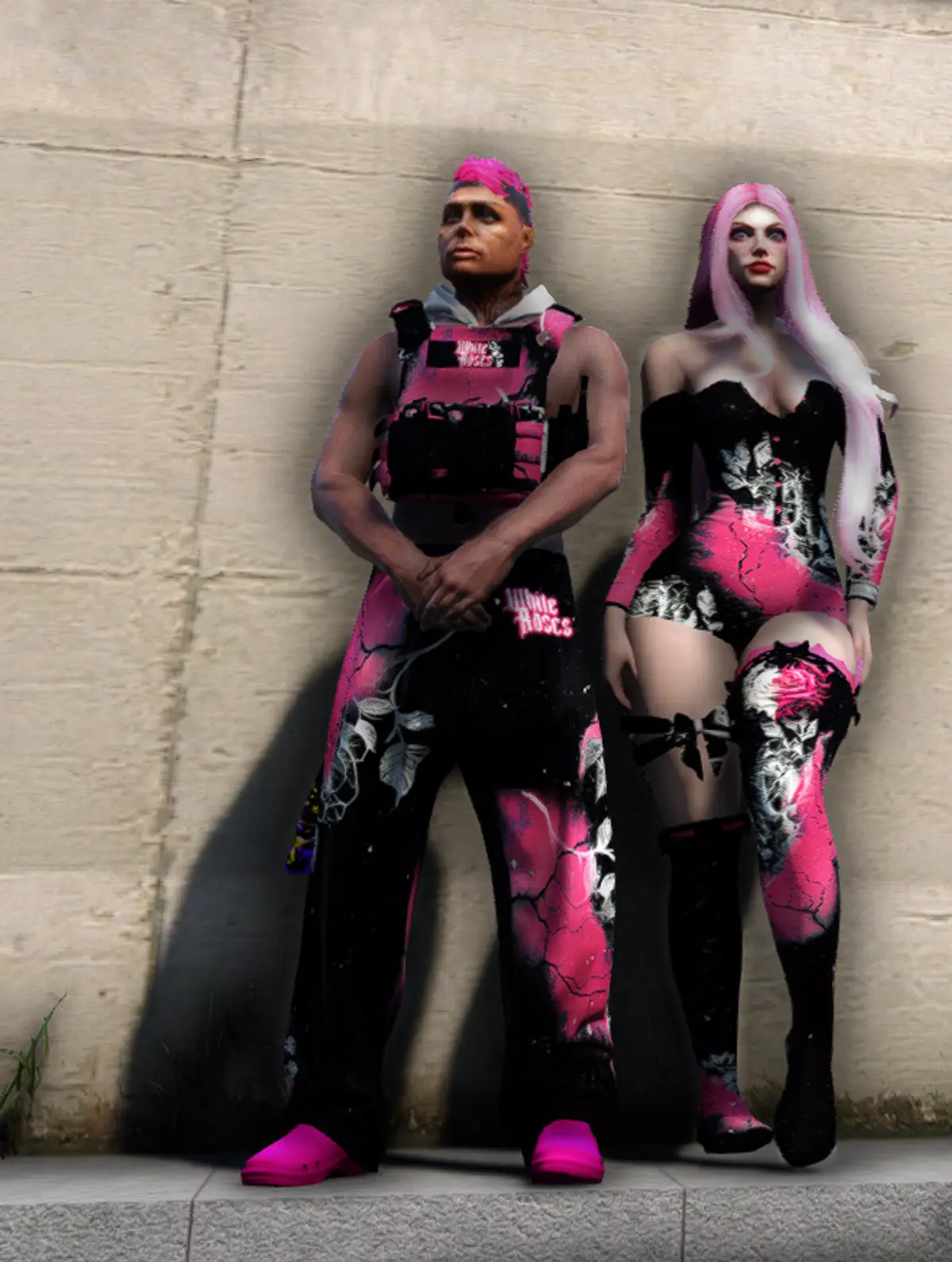 Two Drill UK gang members in matching pink and black White Roses outfits